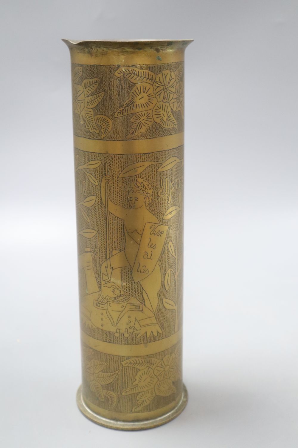 An early 20th century Trench Art vase reads Somme 1916 and Ypres 1914, height 27.5cm
